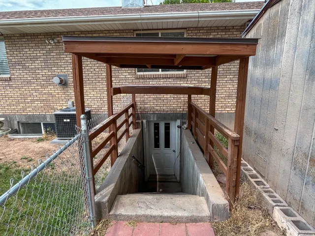 Covered exterior staircase providing separate entry