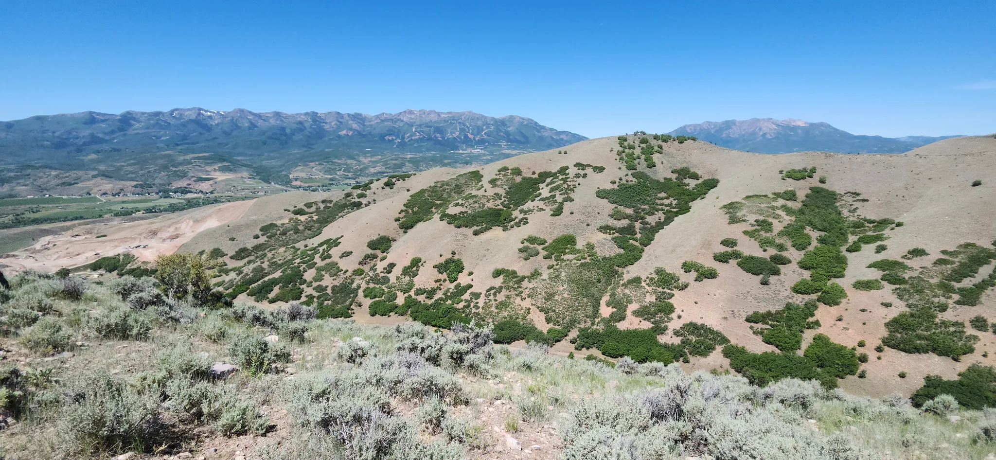 Expansive mountain landscape featuring varied topography.