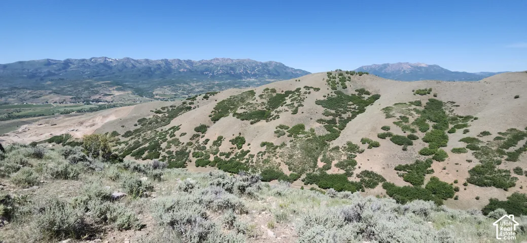 Expansive mountain landscape featuring varied topography.