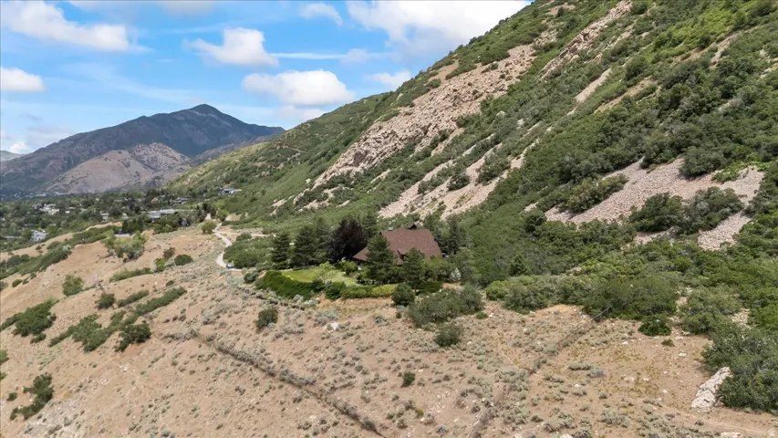 Property nestled into a mountainous landscape