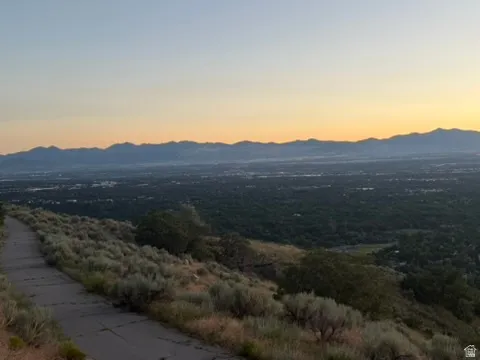 Panoramic mountain backdrop with expansive city below