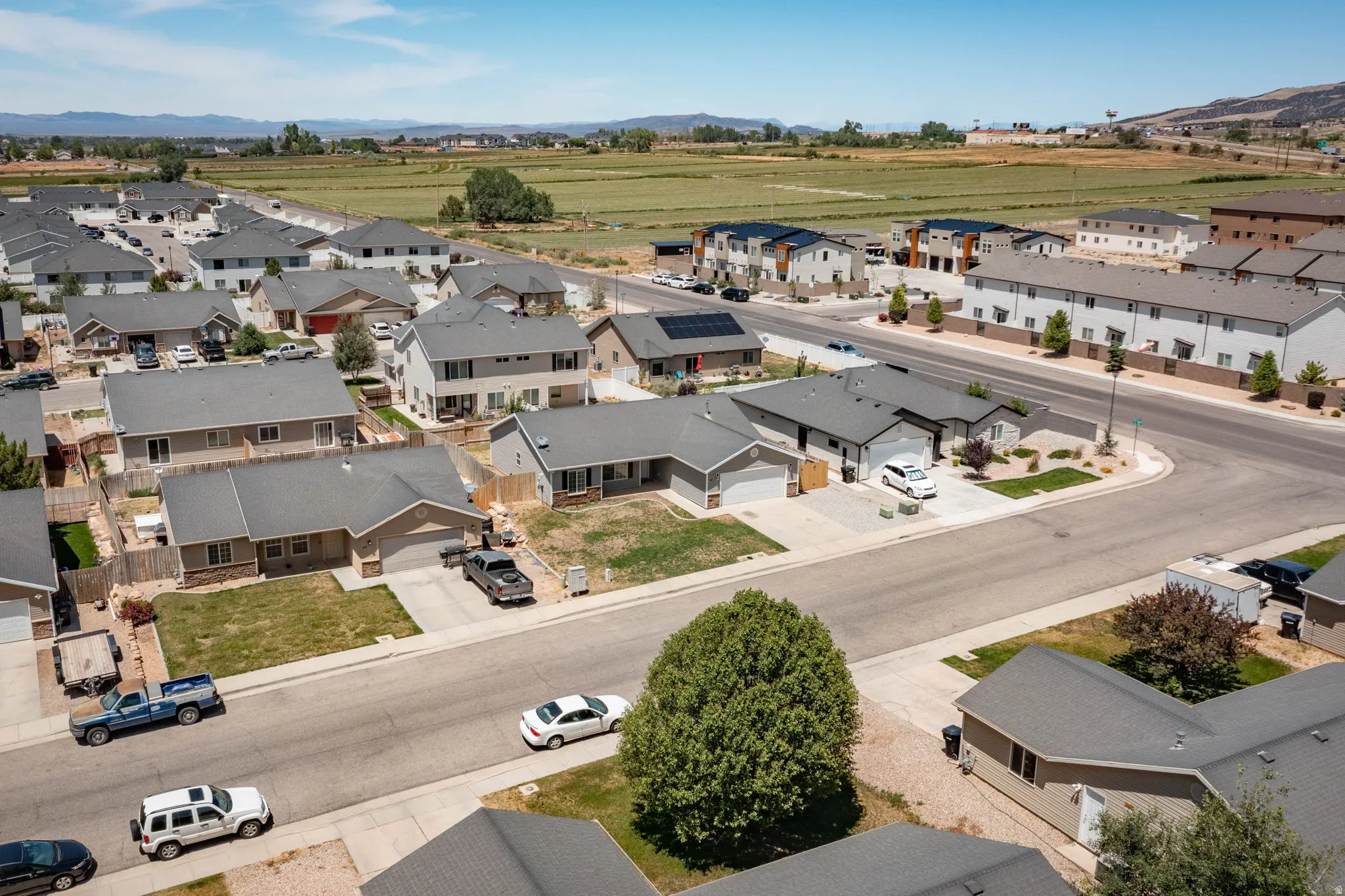 Residential neighborhood featuring a variety of single-family homes and townhouses