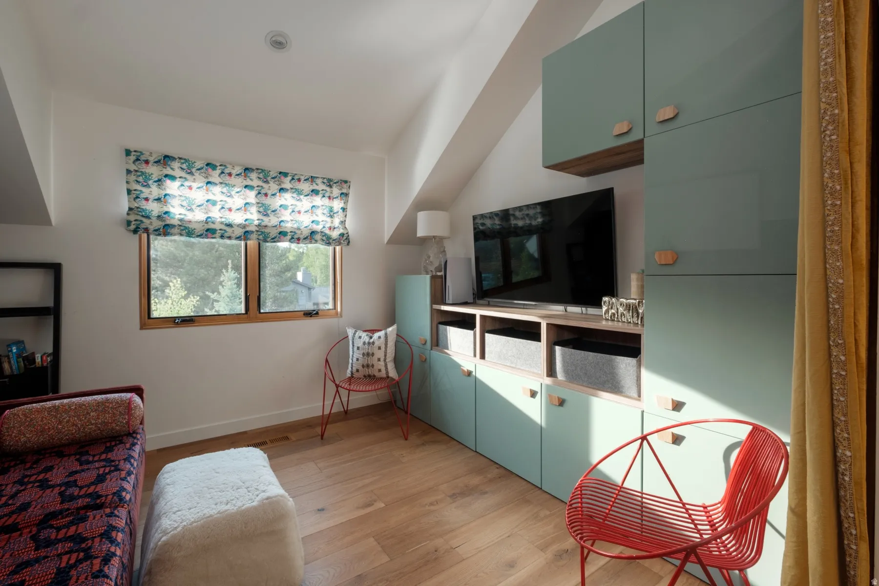 Built-in shelving and cabinetry with accent pulls
