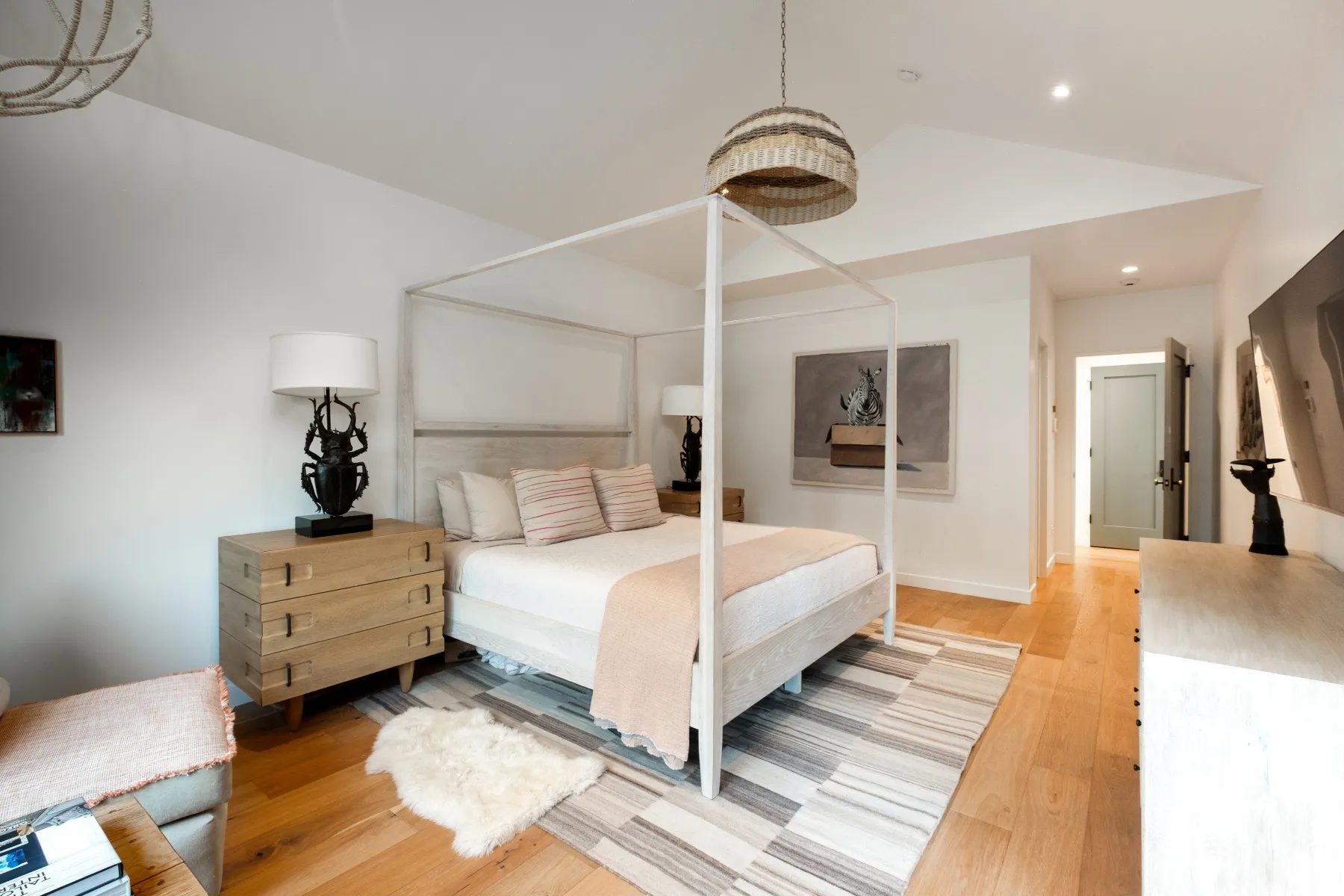 Vaulted ceiling with a woven pendant light fixture