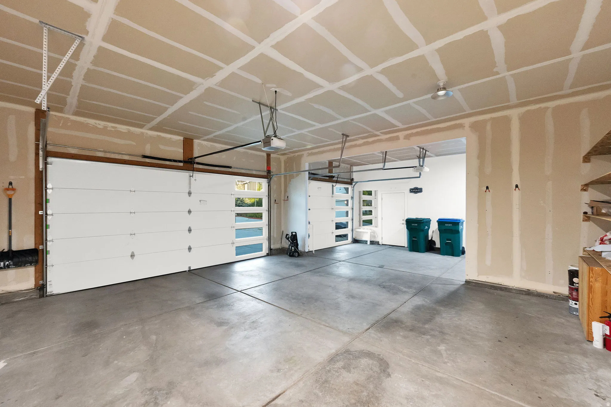 XLarge 3 car garage with EV charger