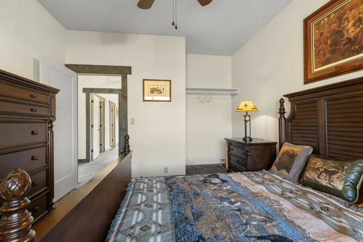 Neutral wall paint with wood-finish trim and doors