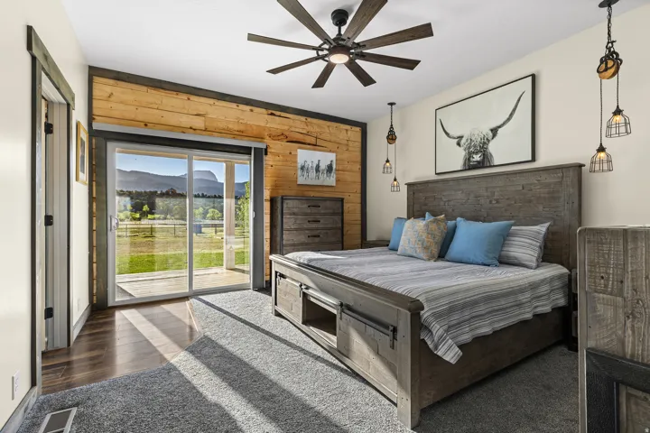 Sliding glass doors opening to a covered patio