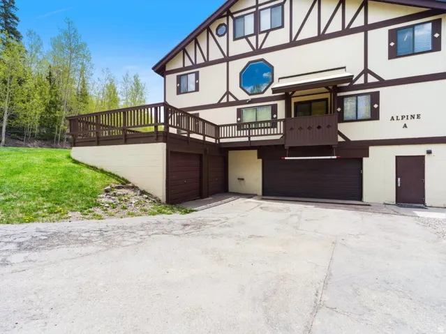 Alpine-style exterior featuring a multi-level design