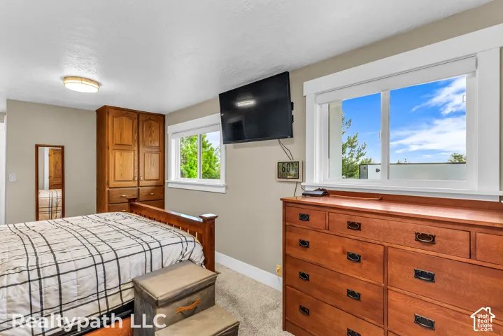 Built-in wood cabinetry provides ample storage