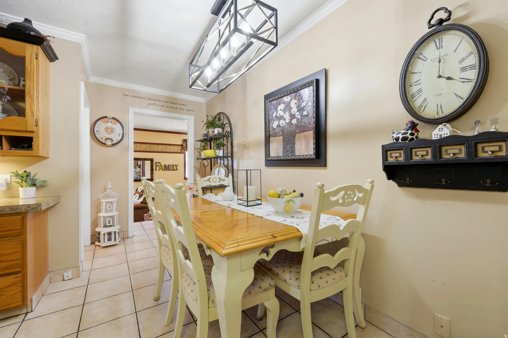 Dining area featuring warm-toned walls and tile flooring