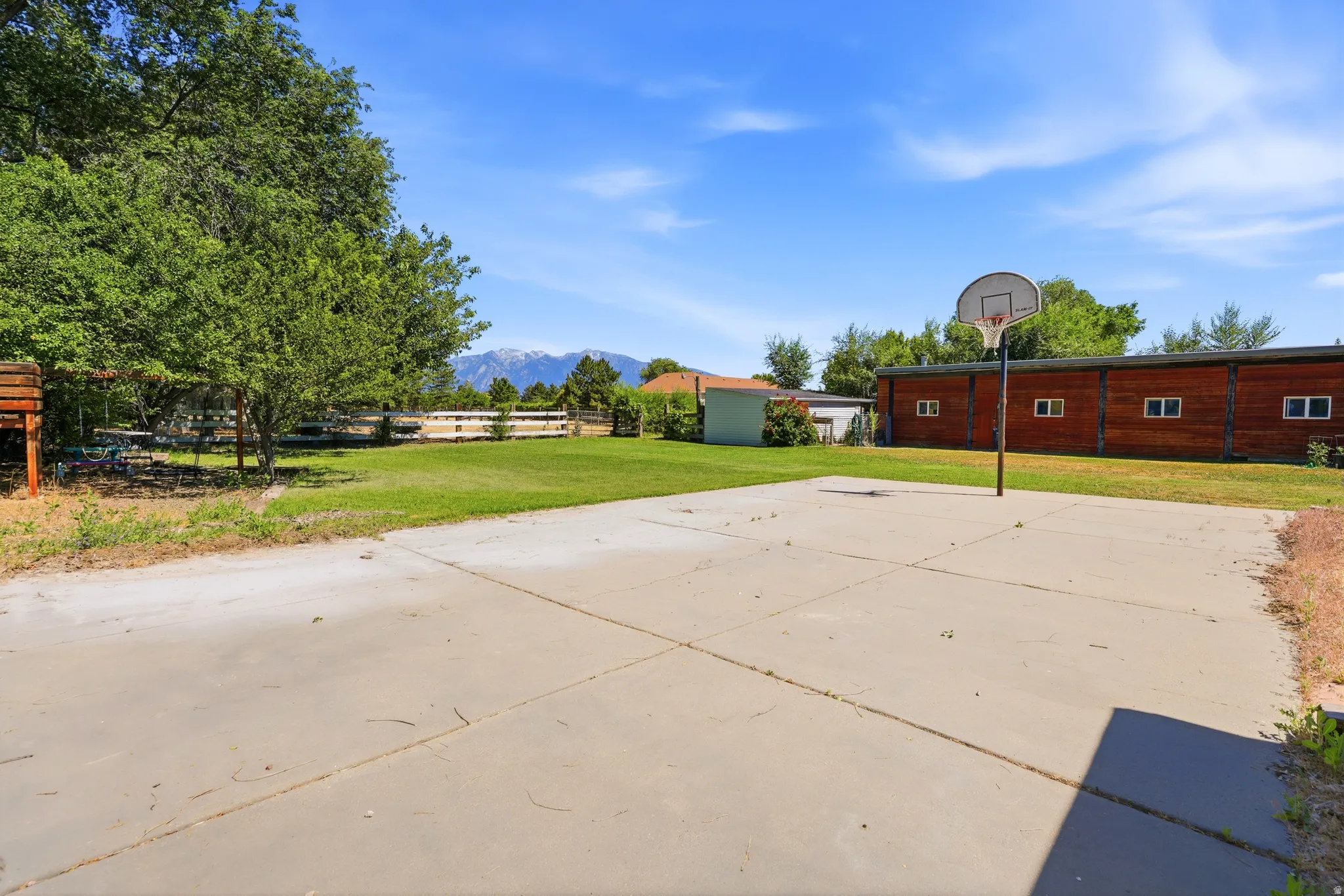 Expansive concrete pad with basketball hoop