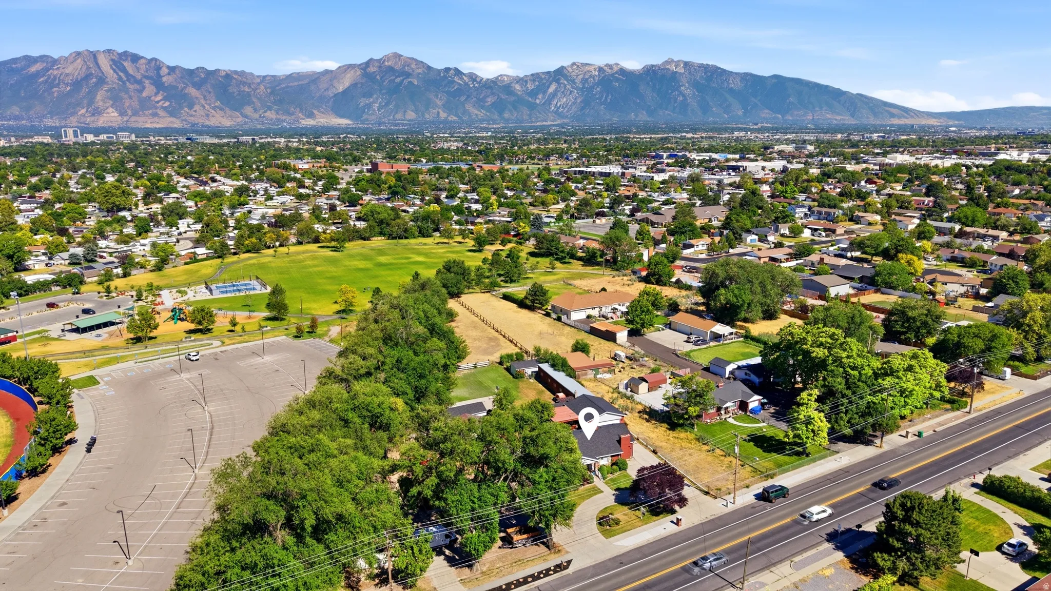 Expansive aerial perspective showcasing a residential area with varied housing styles
