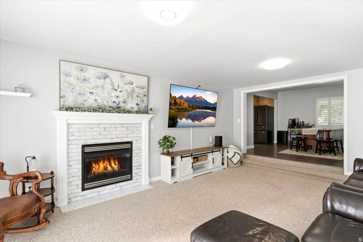Family room is spacious with gas fireplace.