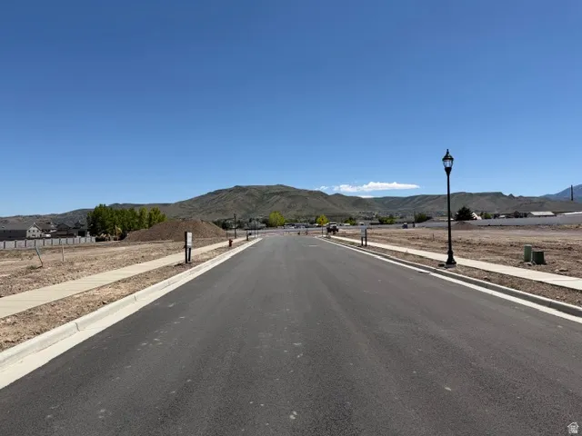 Paved street with concrete sidewalks and curbs
