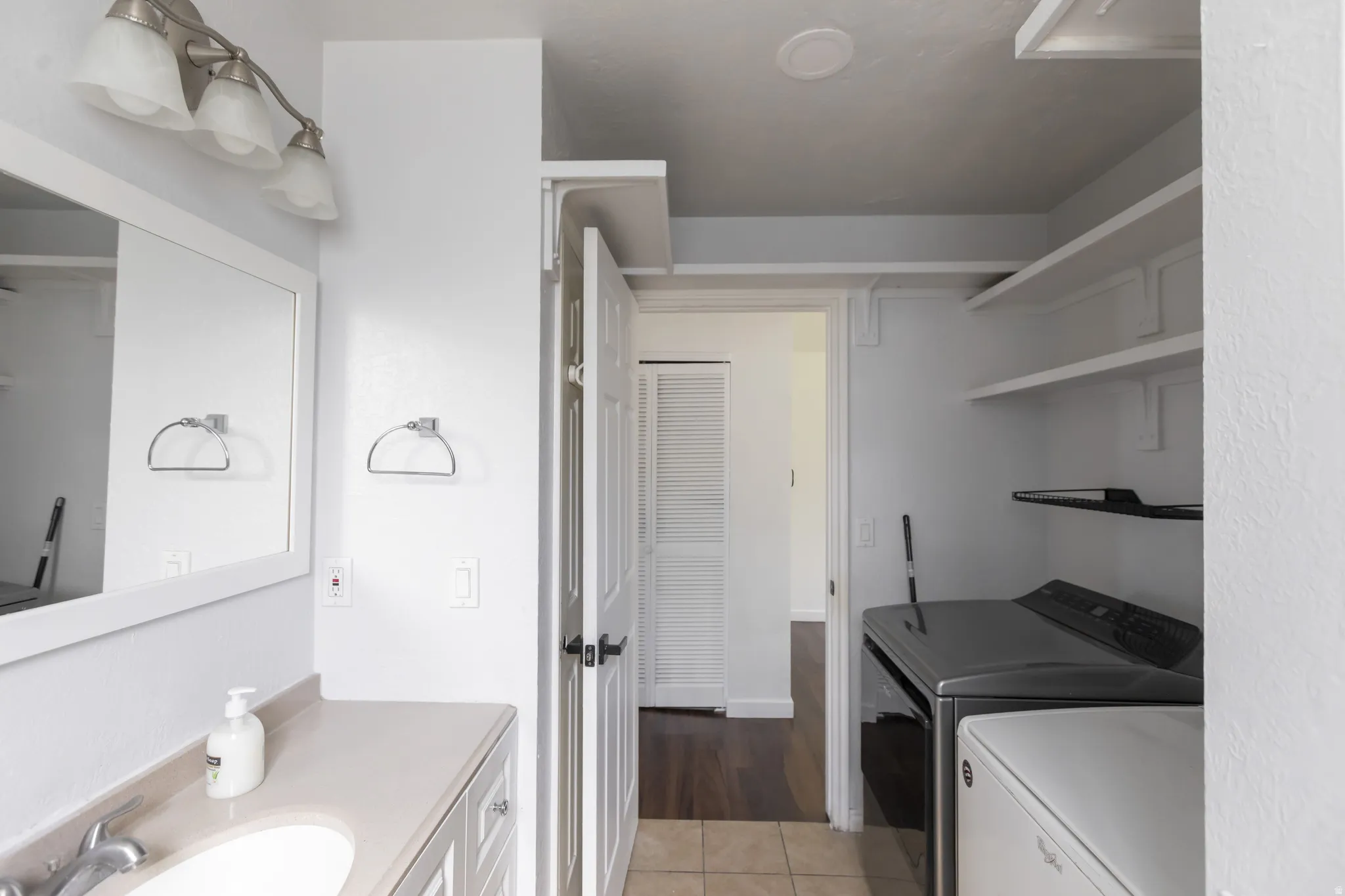 Bathroom with an integrated laundry area