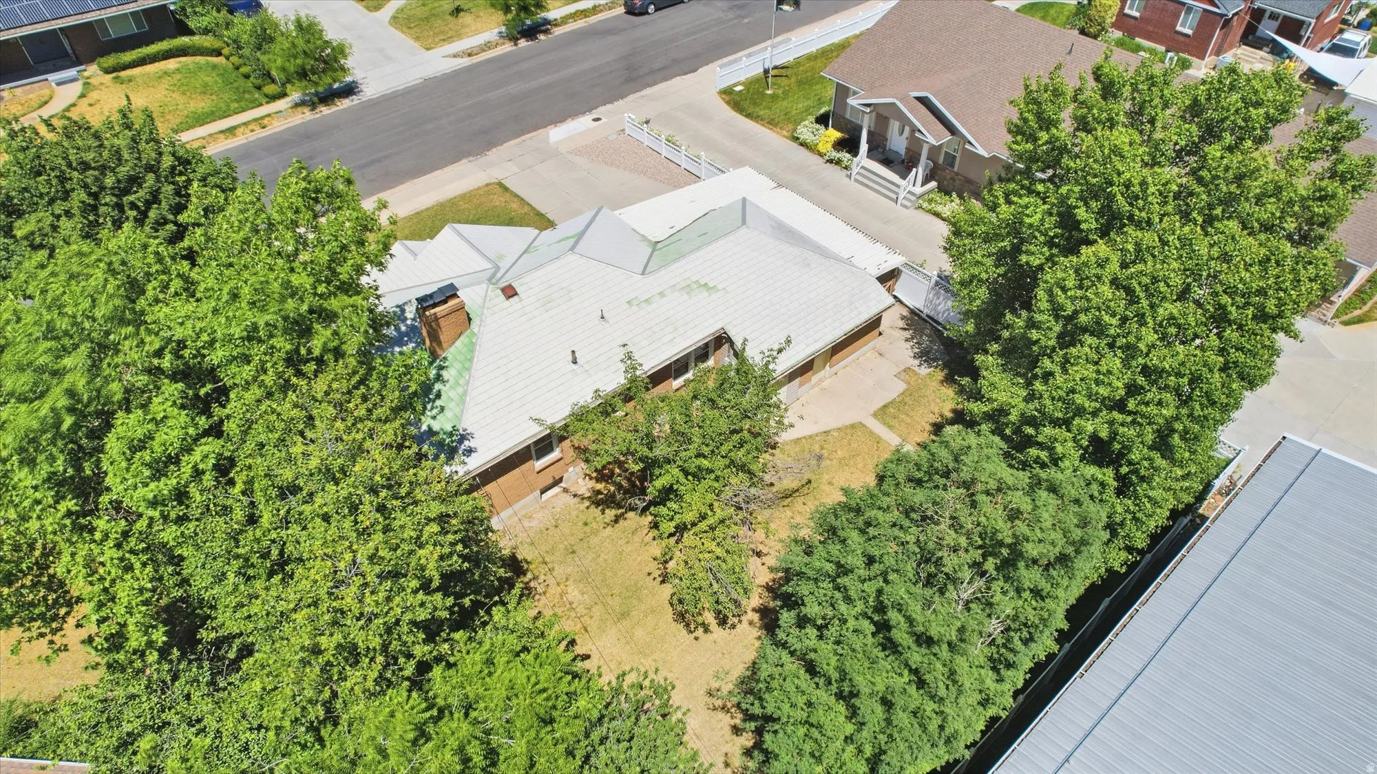 Single-story residence featuring a brick exterior and a multi-gabled roofline