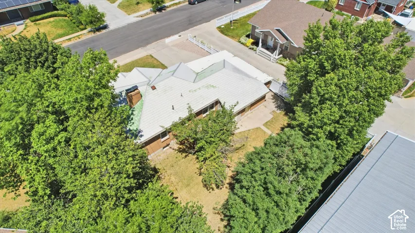 Single-story residence featuring a brick exterior and a multi-gabled roofline