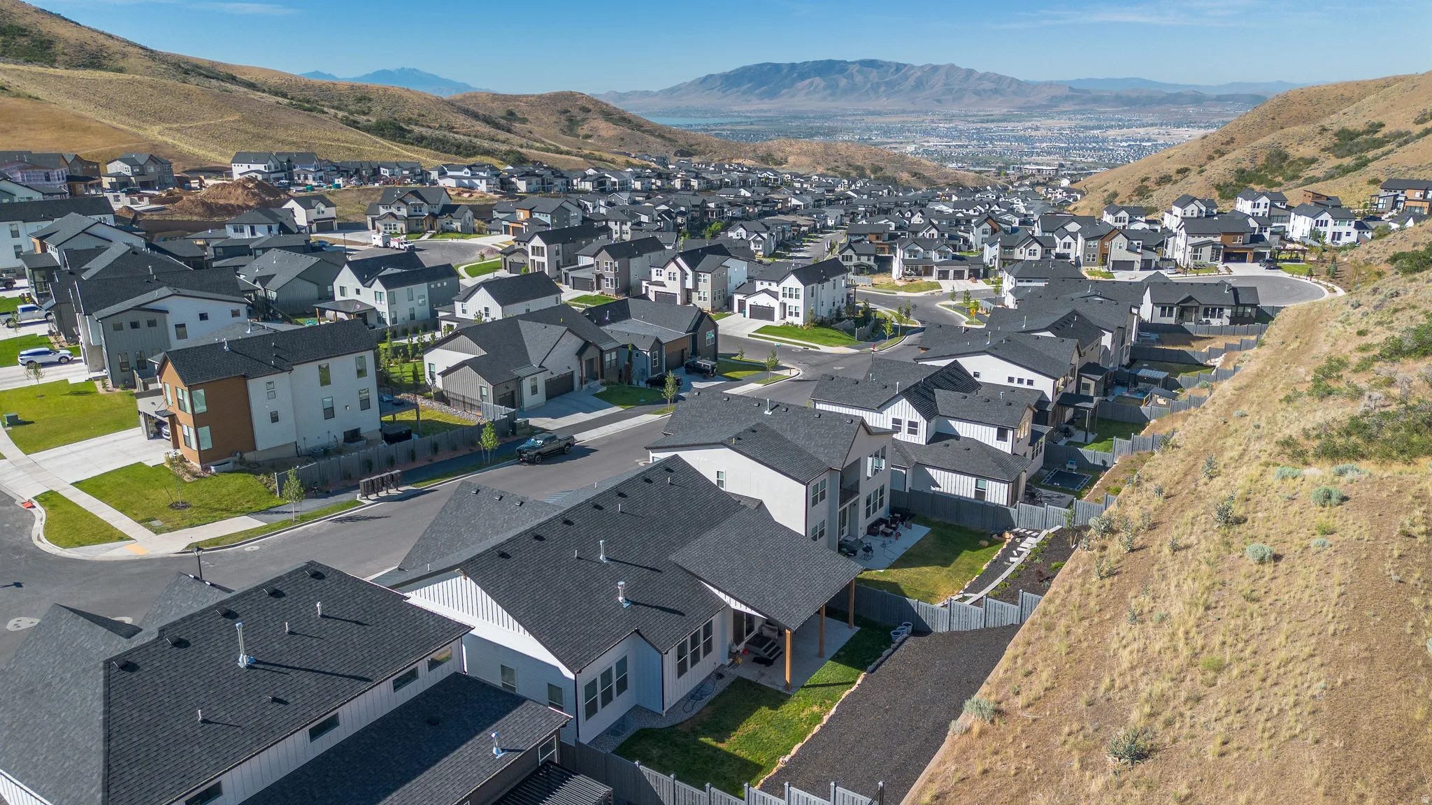 Expansive residential development nestled into rolling hillsides