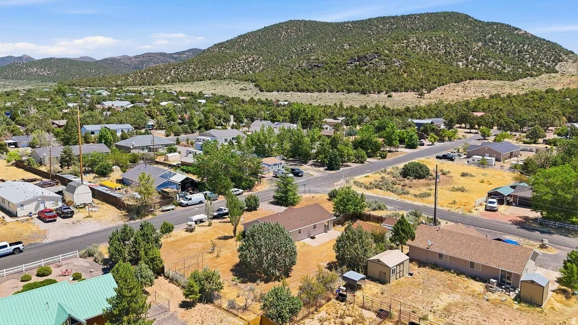 Residential neighborhood featuring a variety of single-story homes with pitched roofs