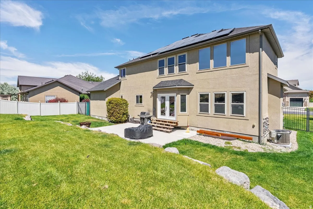 Expansive green lawn providing ample outdoor space