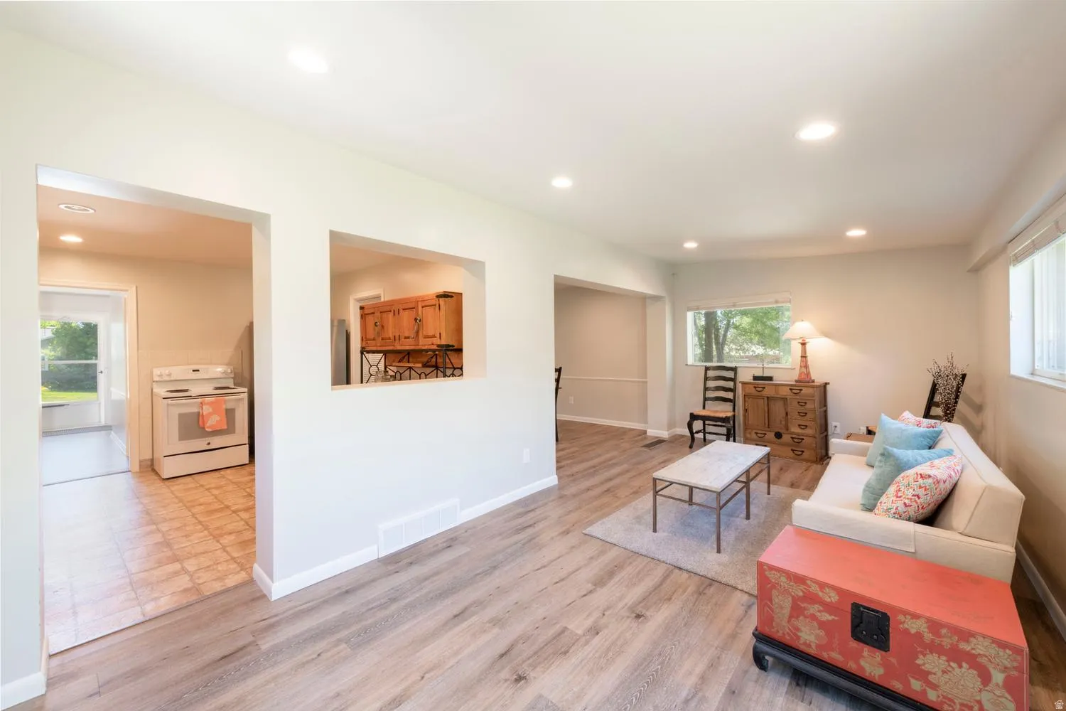 Family room accessing dining room and kitchen