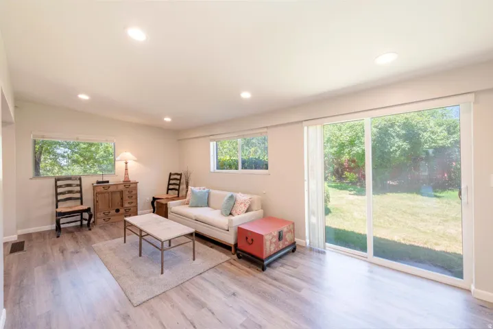 Family room with double plan slider out to backyard