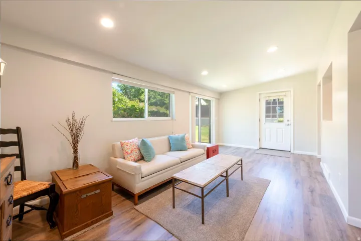 Cozy family room leading out to backyard