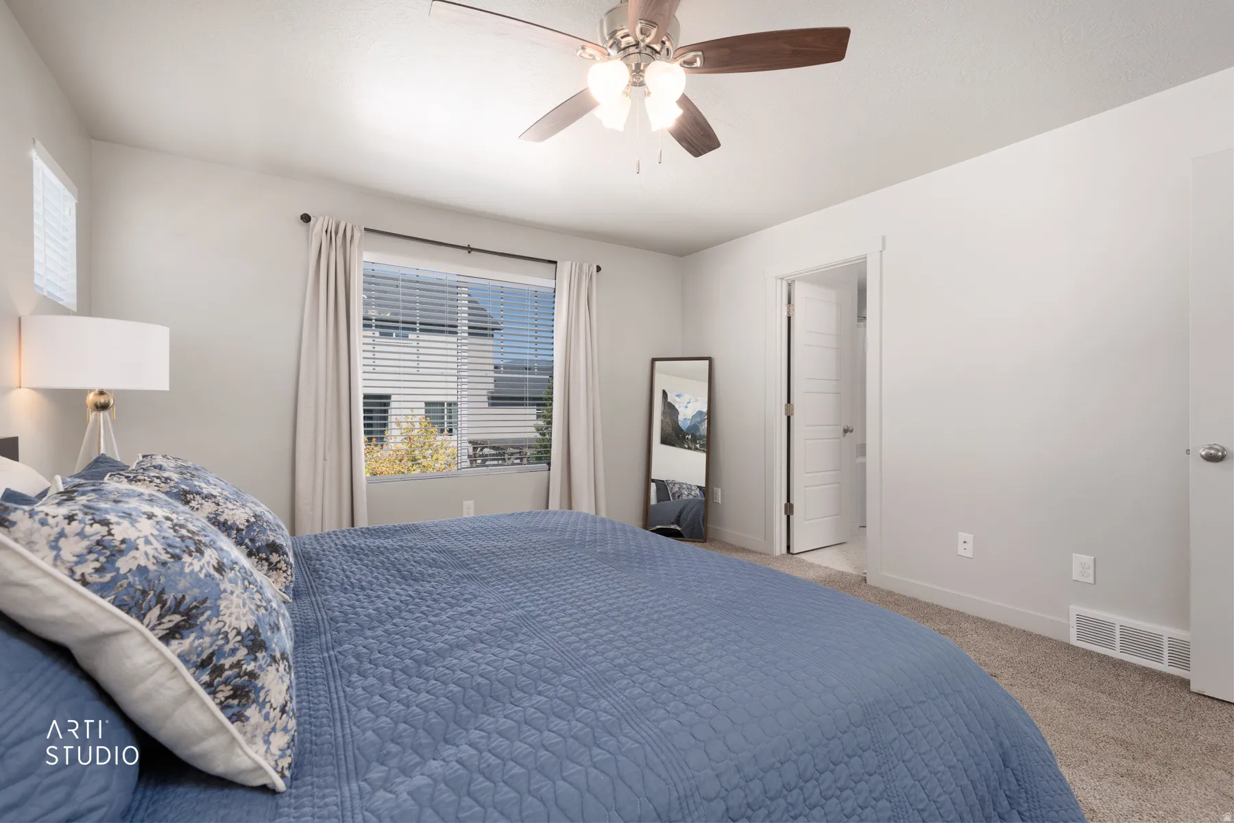 Bedroom featuring light gray wall paint, recessed lighting, and a ceiling fan with wood-finish blades