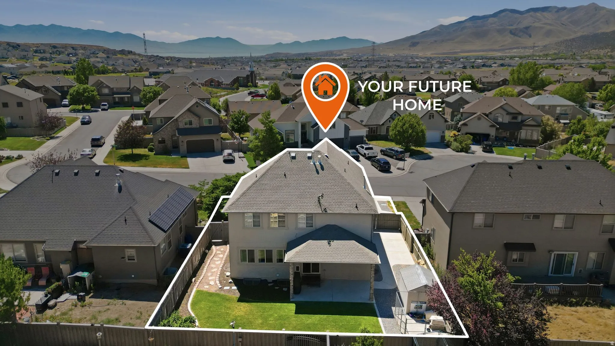Two-story residence with a pitched roof and a rear-facing covered patio