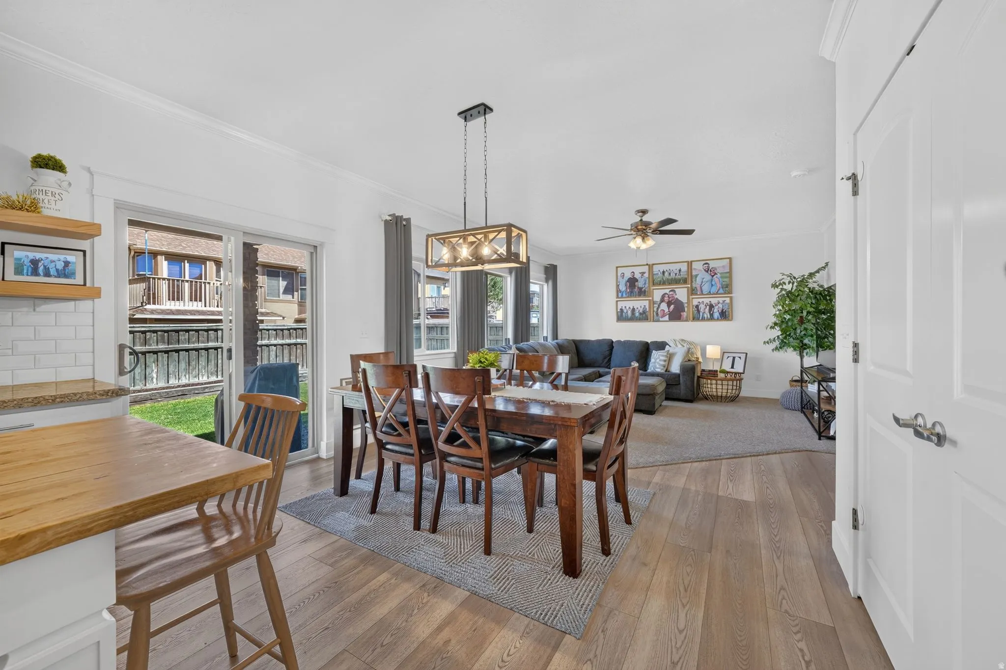 Open-concept living space with wood-finish flooring throughout