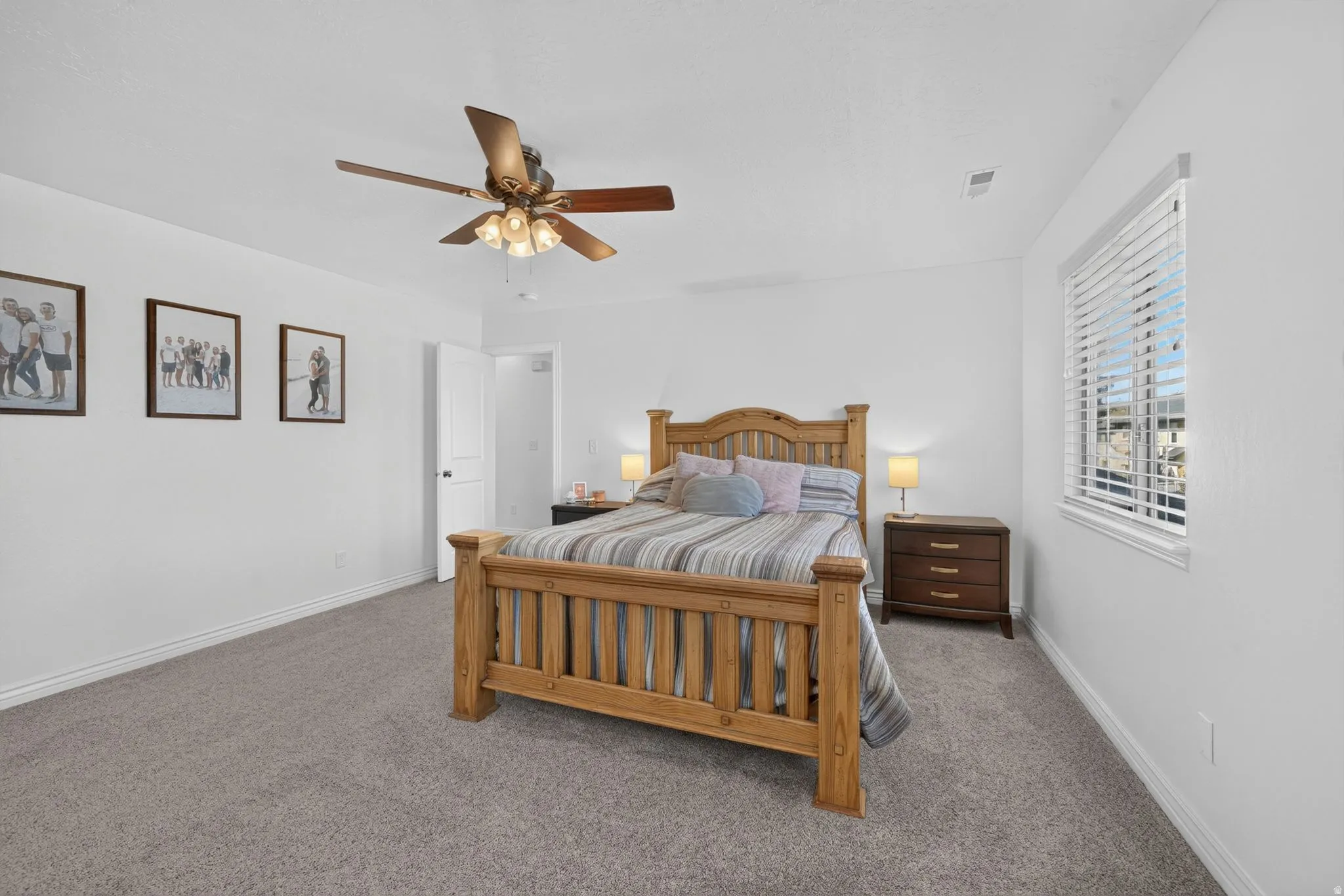 White-painted walls with grey carpet flooring