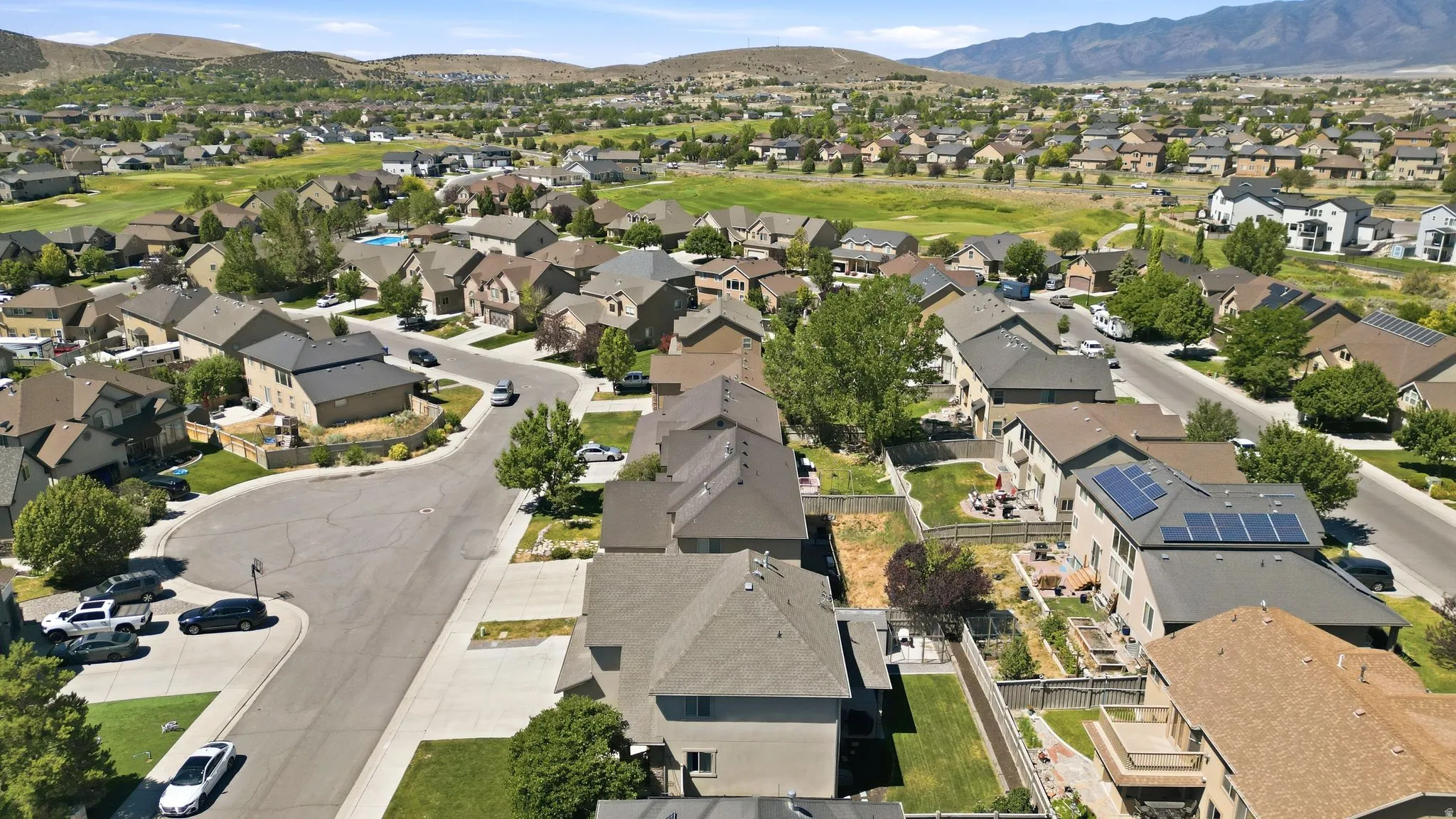 Aerial perspective showcasing a residential community with varied architectural styles