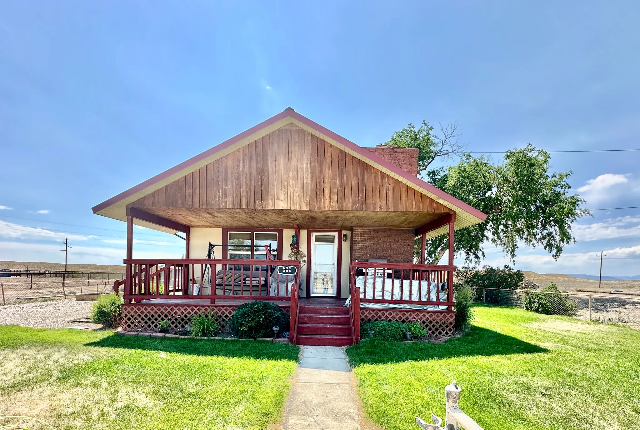 Front view w/ welcoming front porch