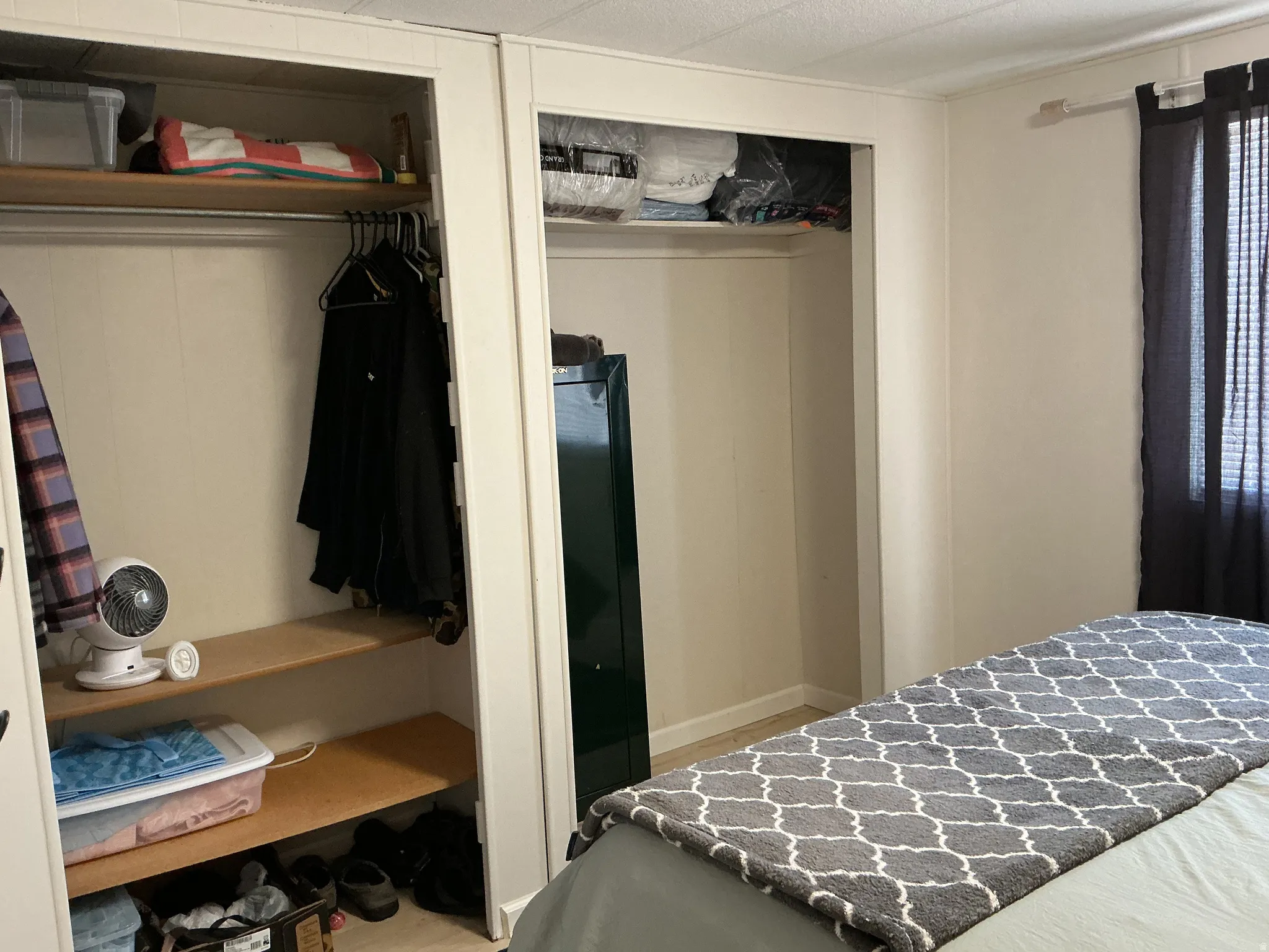 Built-in closet system featuring shelving and hanging rods