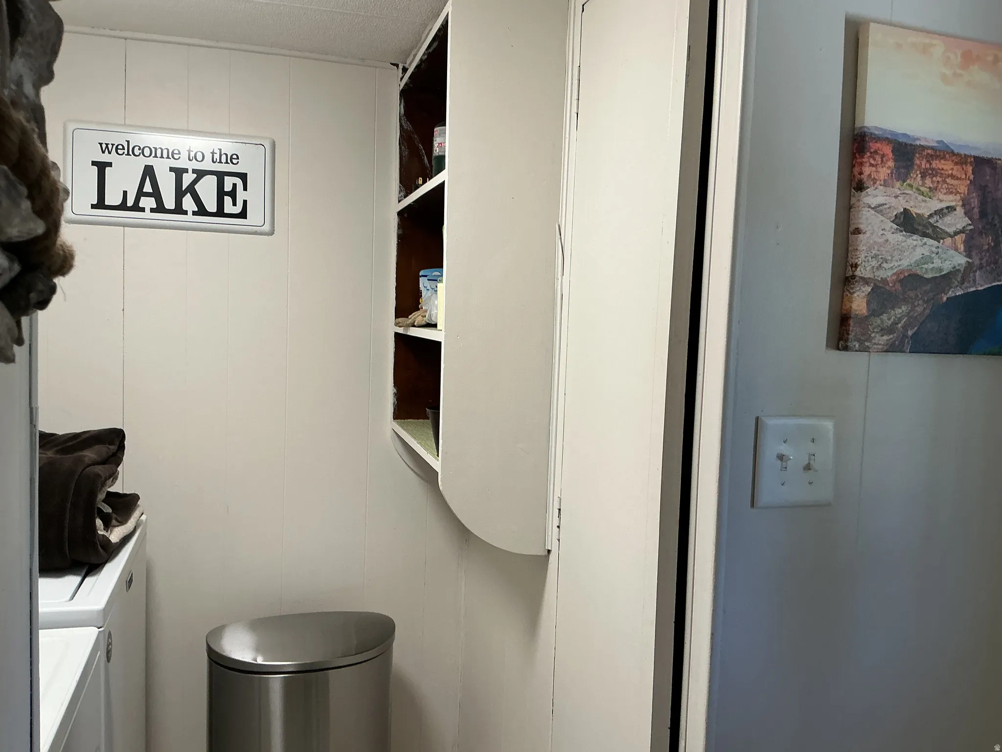 Built-in shelving unit with multiple storage compartments