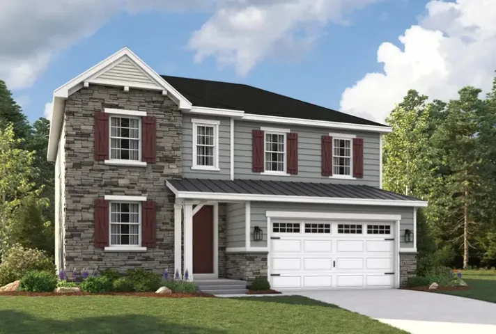 Two-story residence featuring a stone facade and horizontal siding. HOME IS BEING BUILT WITH A 3RD CAR GARAGE!
