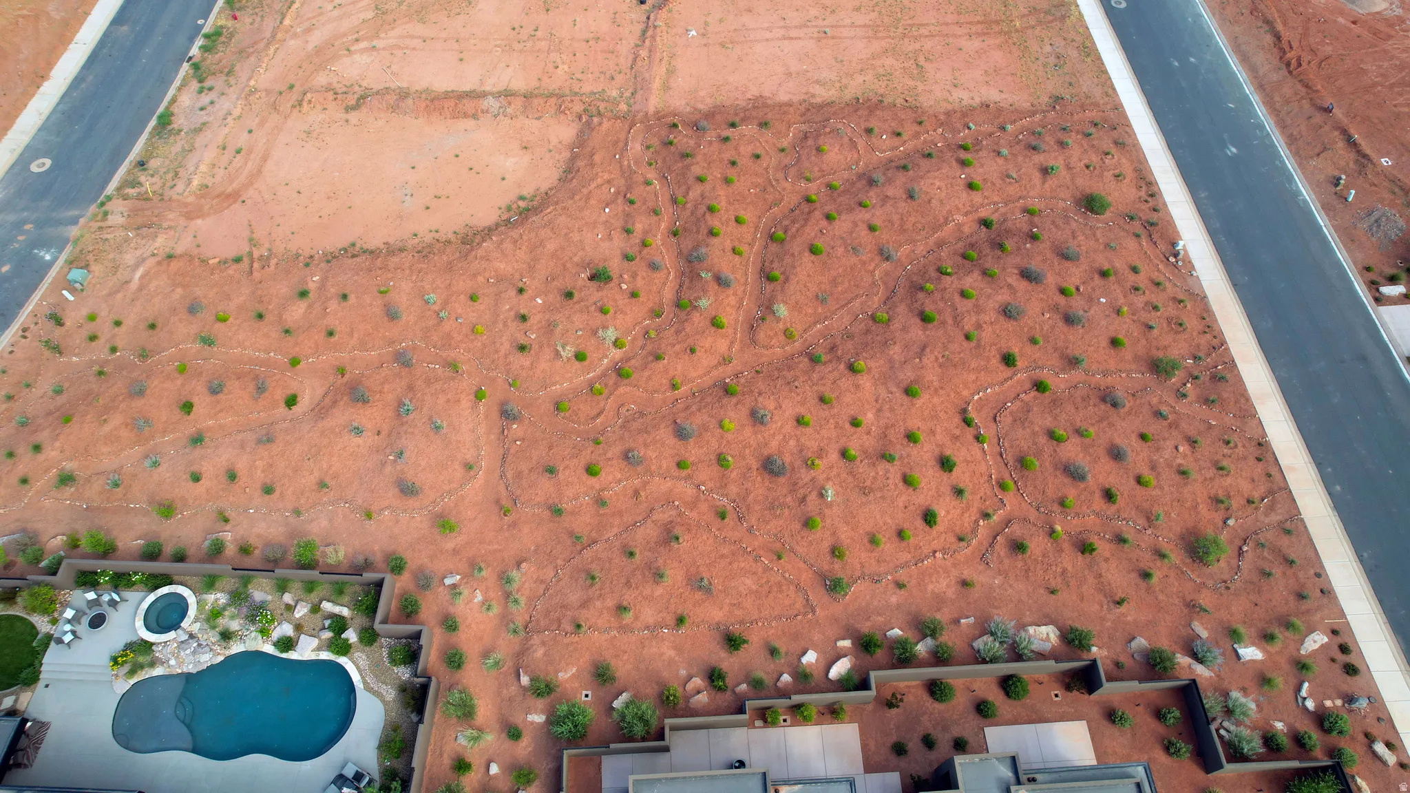 Expansive view protection parcel  included featuring natural desert vegetation, defined property boundaries, and direct street frontage on two sides