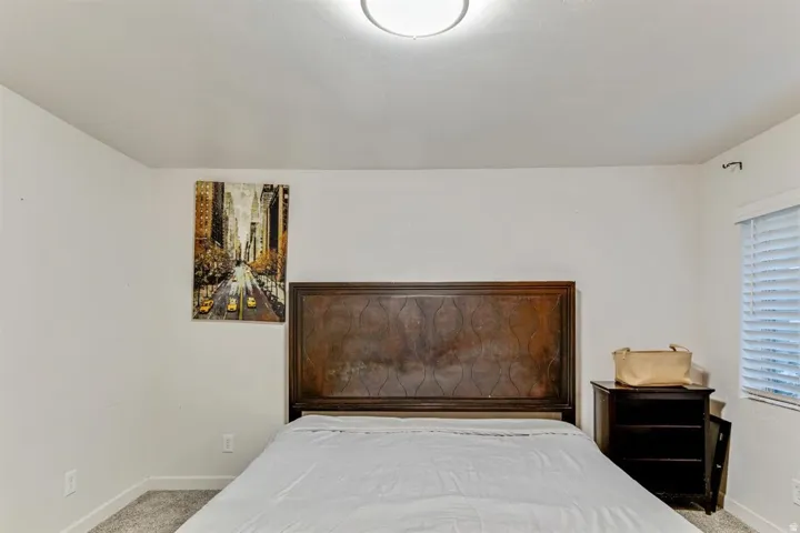 Neutral white walls with a ceiling-mounted light fixture