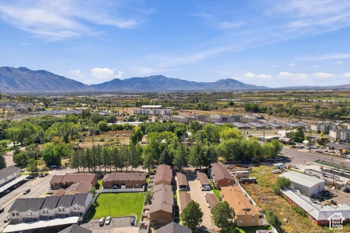 Expansive mountain backdrop with a clear blue sky