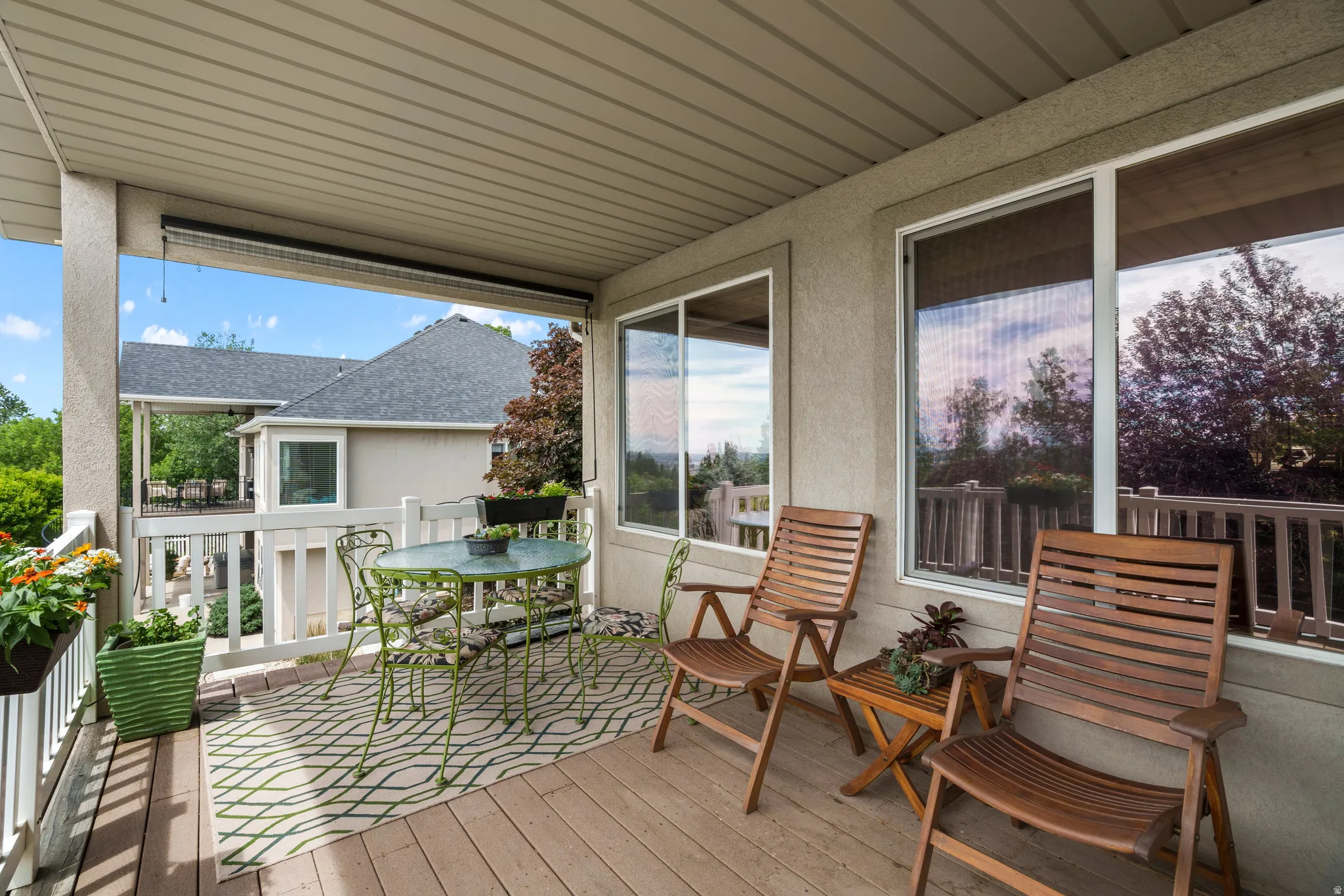 Covered deck featuring perfect scenic view great for enjoying the outside
