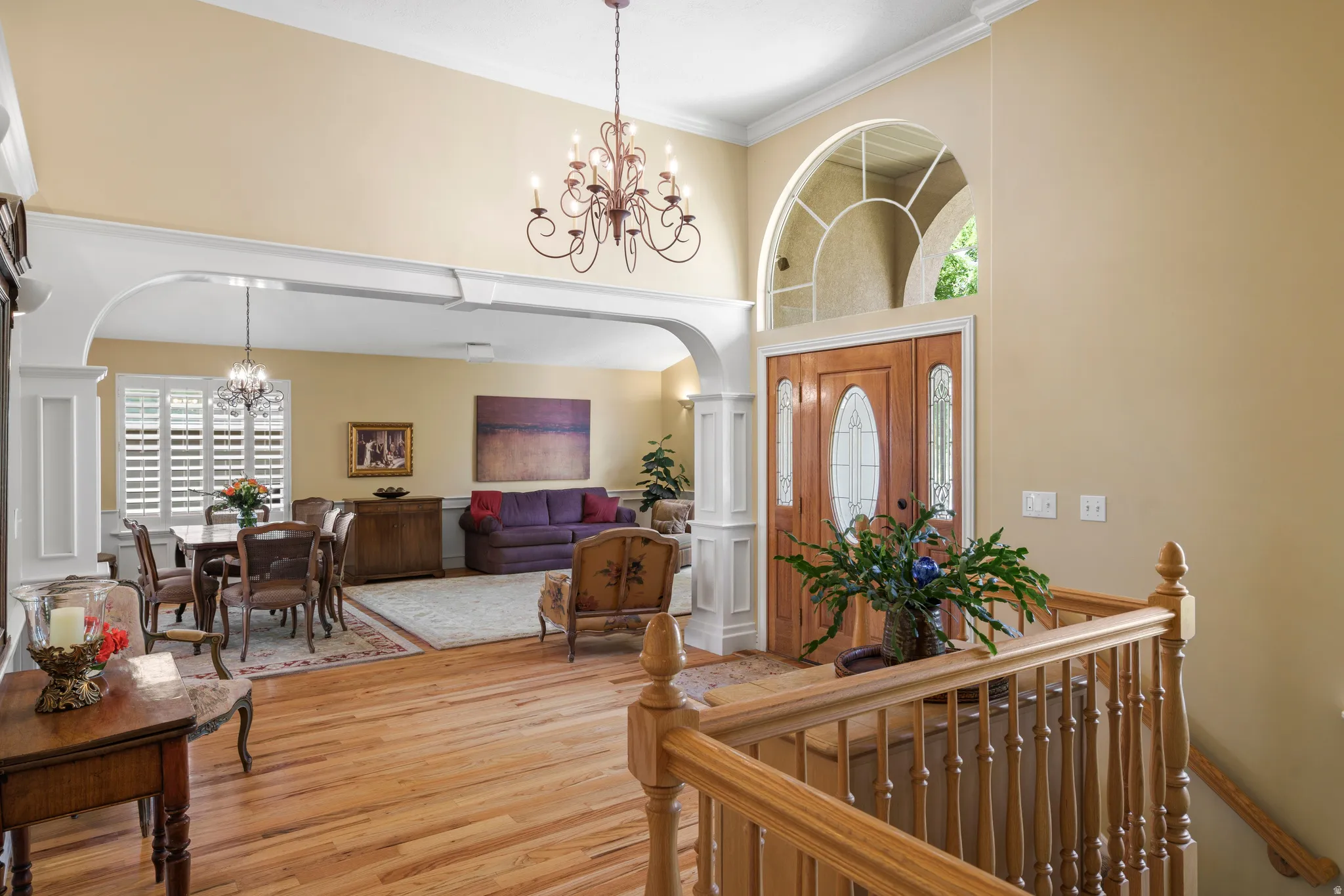 Grand foyer featuring a wood entry door