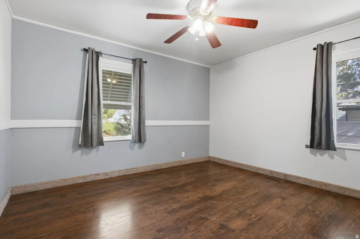 Bedroom#1 Wood-finish flooring with textured wall-to-wall carpeting along the perimeter
