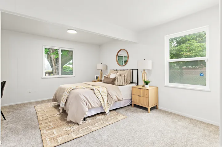 Neutral wall paint enhancing natural light from multiple windows