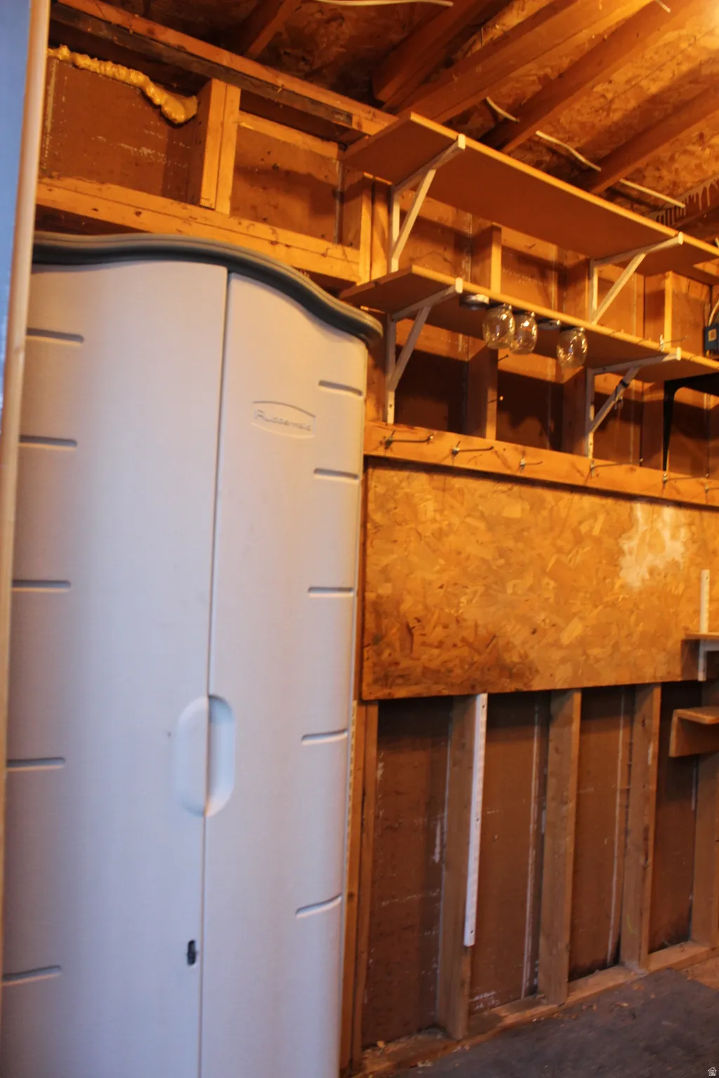 Inside storage shed at the end of the driveway.