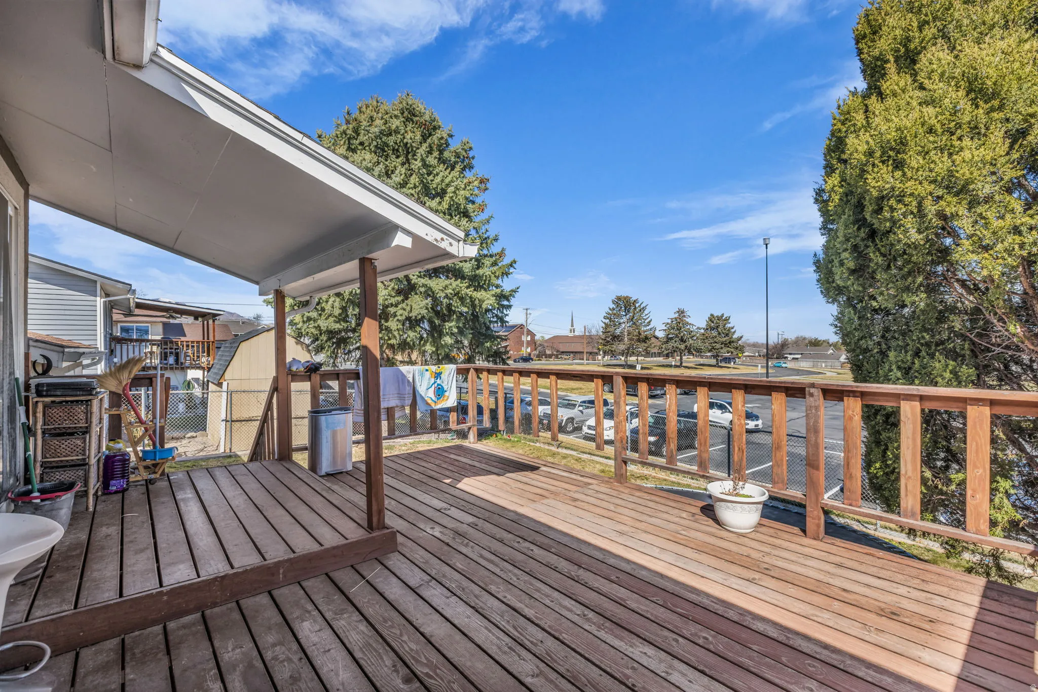 Expansive wood deck with a sturdy wood railing