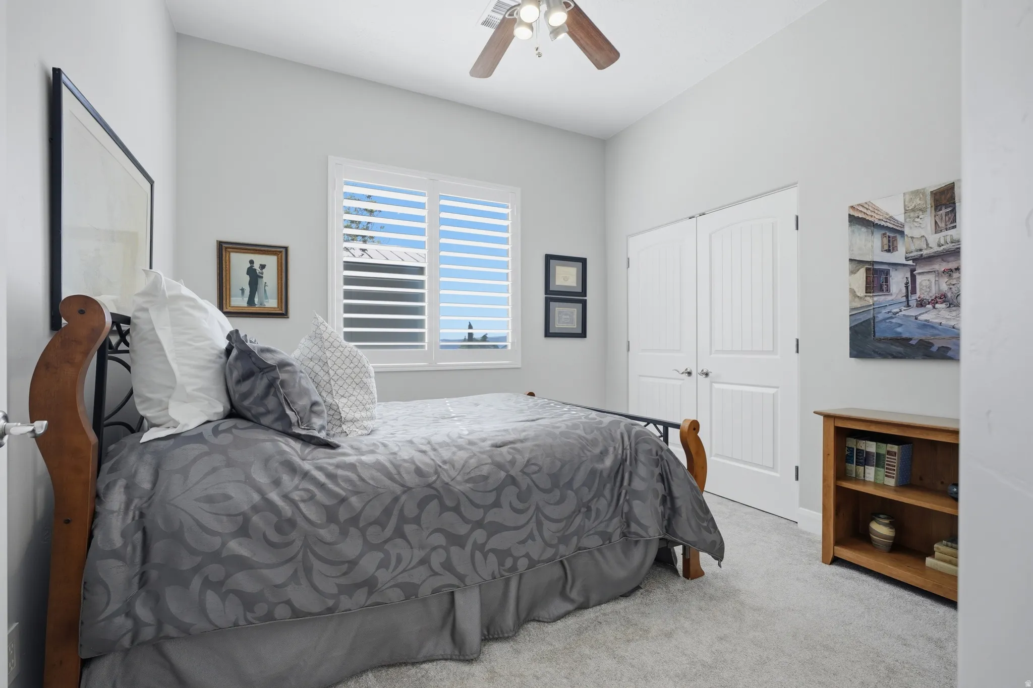 Bedroom featuring plush carpeting and a neutral color palette
