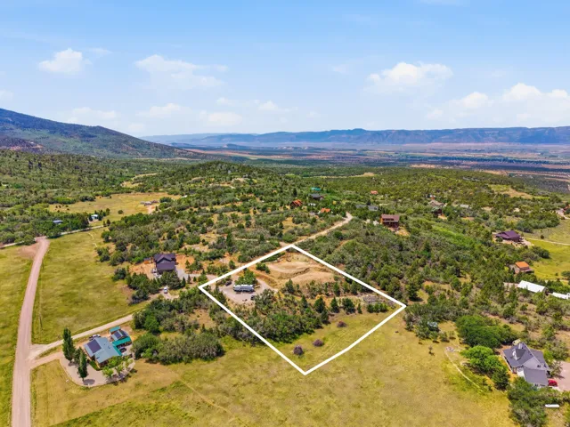 Expansive lot featuring a natural landscape and distant mountain ranges
