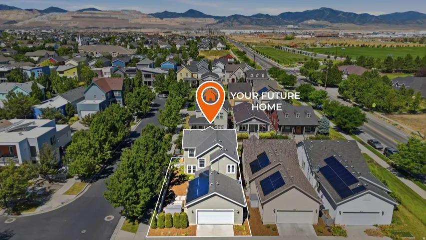 Aerial perspective highlighting a two-story residence with a light gray exterior and white trim
