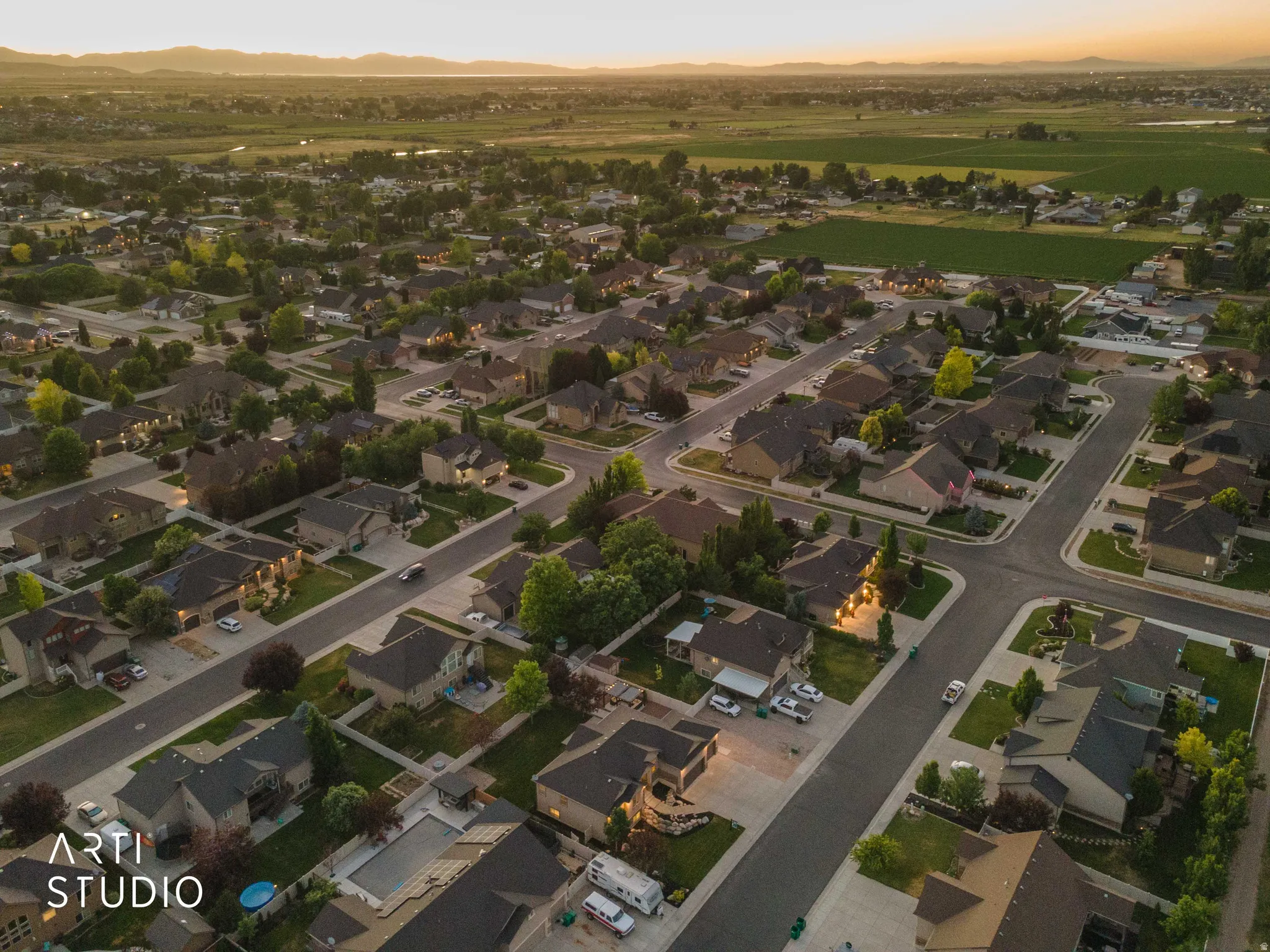 Expansive residential community featuring a variety of single-family homes with pitched roofs and established landscaping