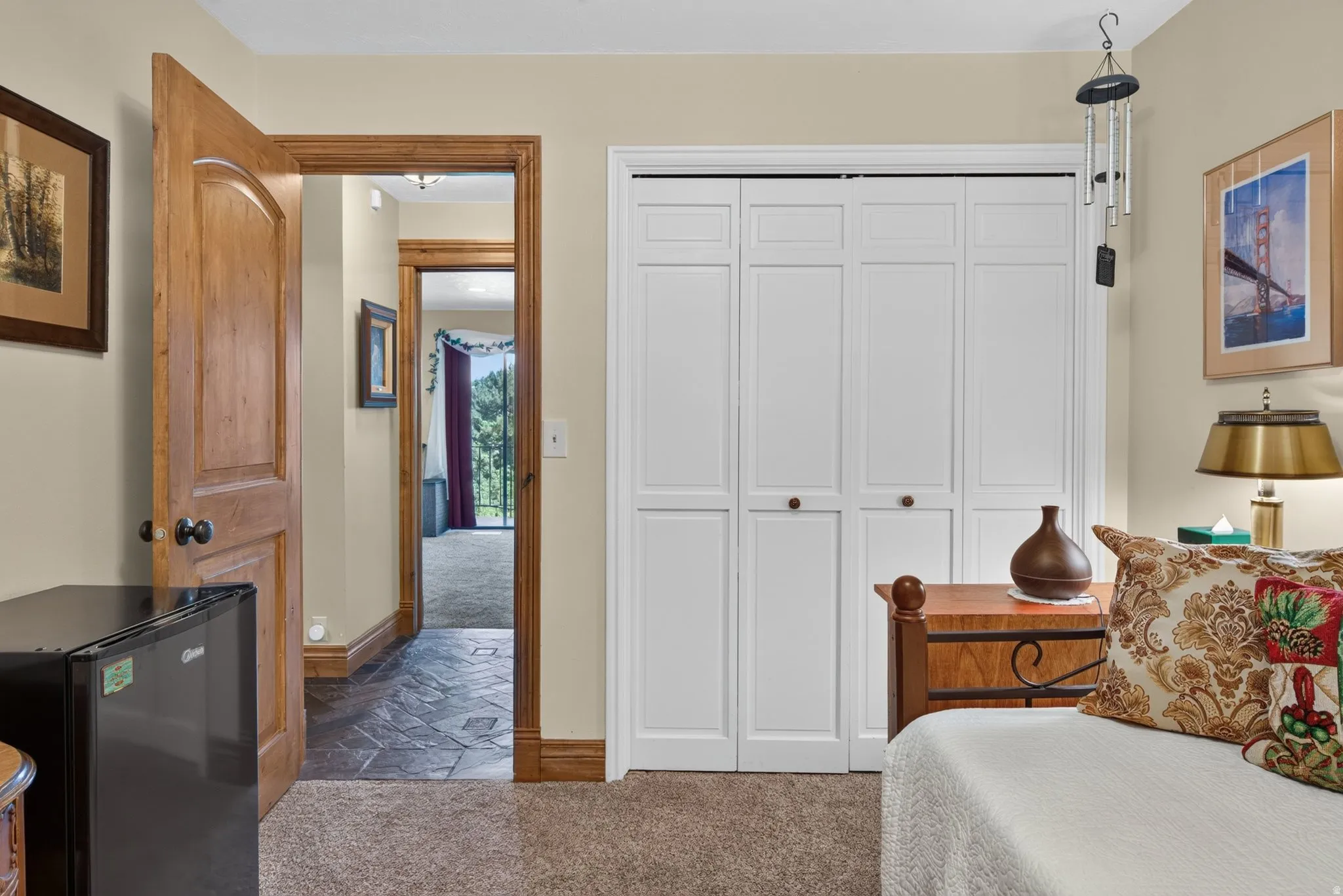 White bi-fold closet doors with panel detailing